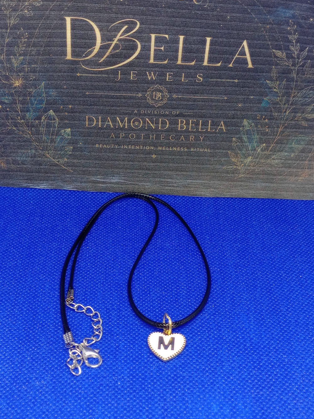 Gold Heart Initial M Pendant on Black Cord